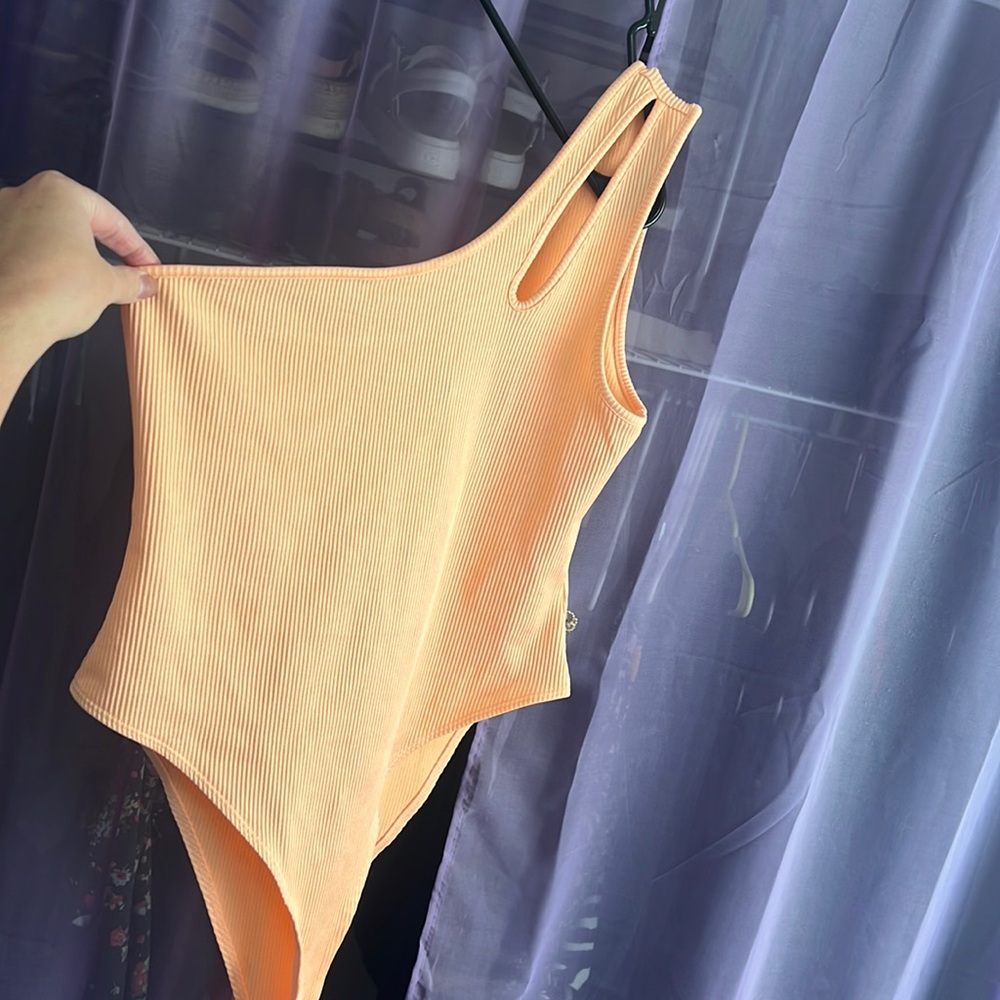 Orange bodysuit